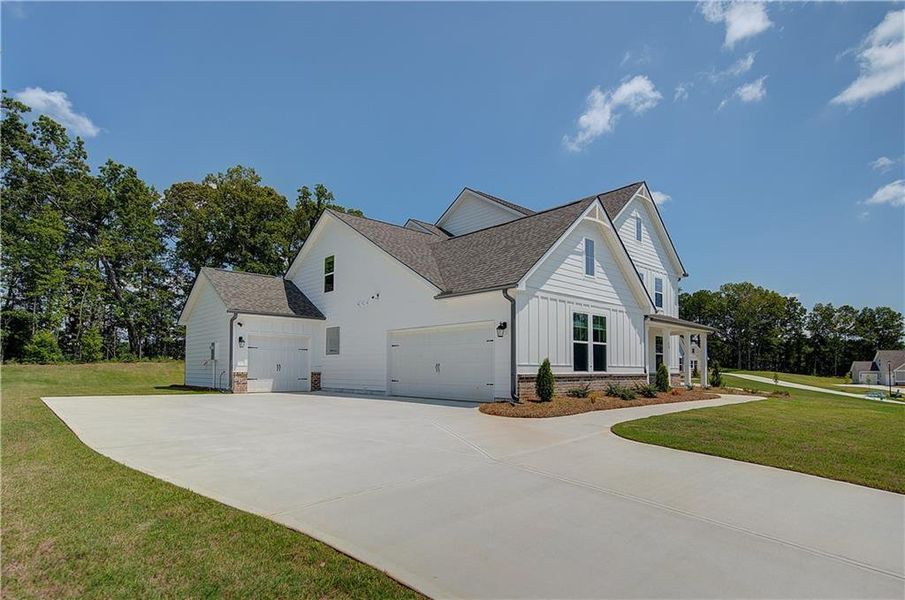 Front exterior of a new home in , Senoia, GA, highlighting curb appeal (Image 18).