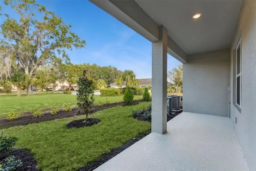 Exterior details and patio area of a home in Connors Cove, Eustis (Image 3).