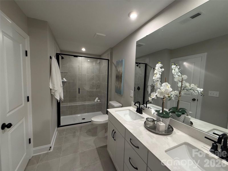 Furnished interior view inside a new home in The Townes at Wade Ardrey, Charlotte (Image 14).
