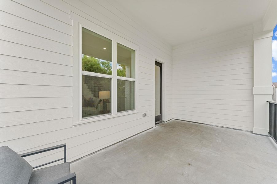 Exterior details and patio area of a home in , Houston (Image 4).