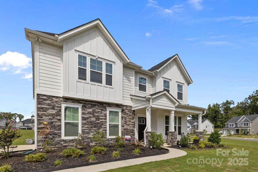 Front exterior of a new home in , Indian Trail, NC, highlighting curb appeal (Image 27).