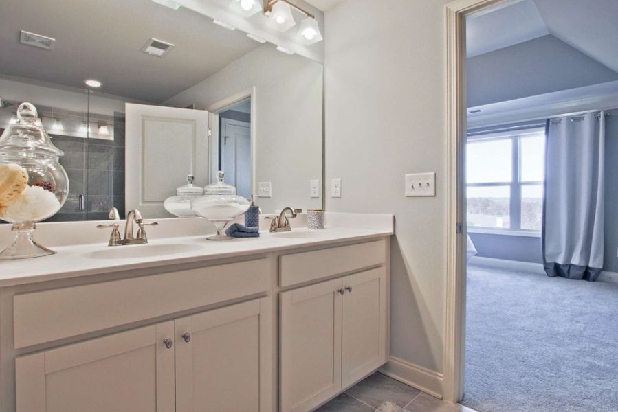 Representative furnished interior of a home built from the Barwick by KM Homes in Nickel Creek at Newnan Crossing, Newnan (Image 16).