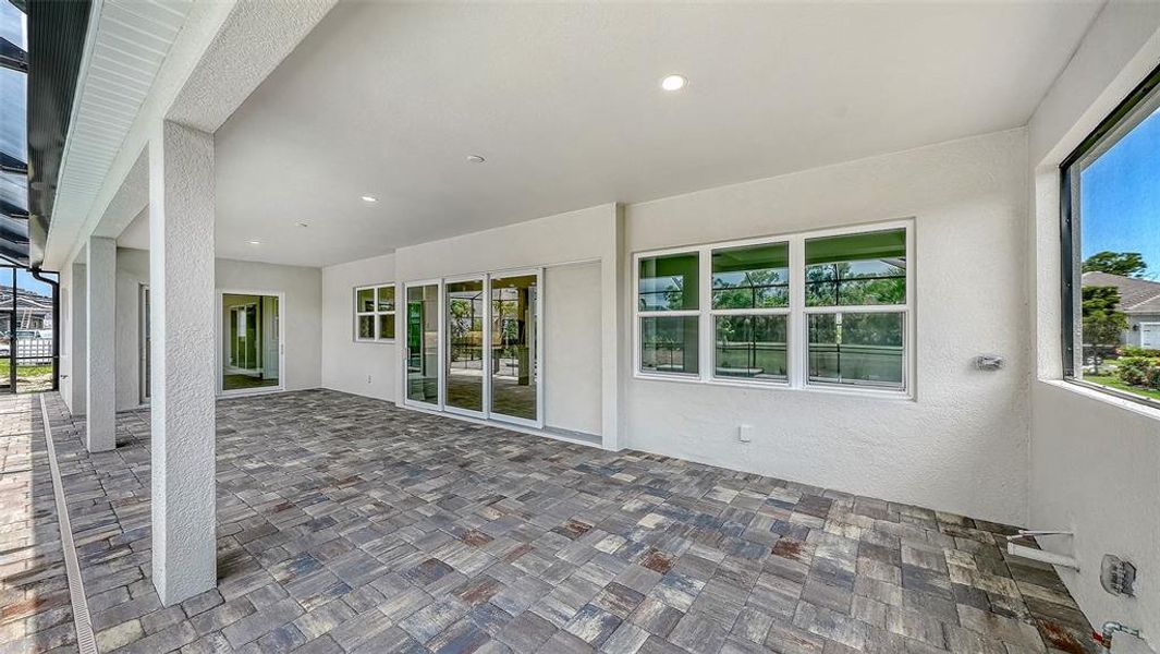 Exterior details and patio area of a home in Grand Park, Sarasota (Image 27). Exterior details and patio area of a home in Grand Park, Sarasota (Image 27).
