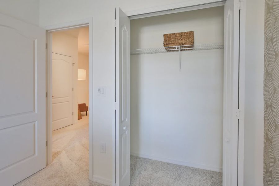 Representative unfurnished interior of a home built from the Morgan by Neal Communities in SkySail, Naples (Image 19).