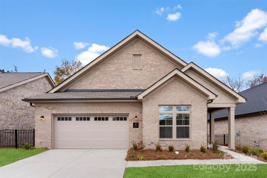 Front exterior of a new home in The Courtyards on New Hope, Gastonia, NC, highlighting curb appeal (Image 2).