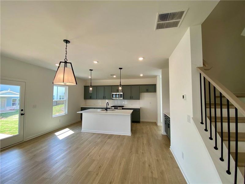 Furnished interior view inside a new home in Eastlyn Crossing, Flowery Branch (Image 8).