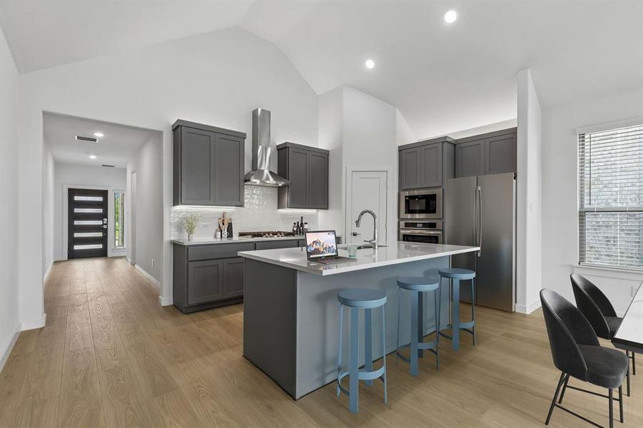 Kitchen in the Claret home plan by Trophy Signature Homes – REPRESENTATIVE PHOTO