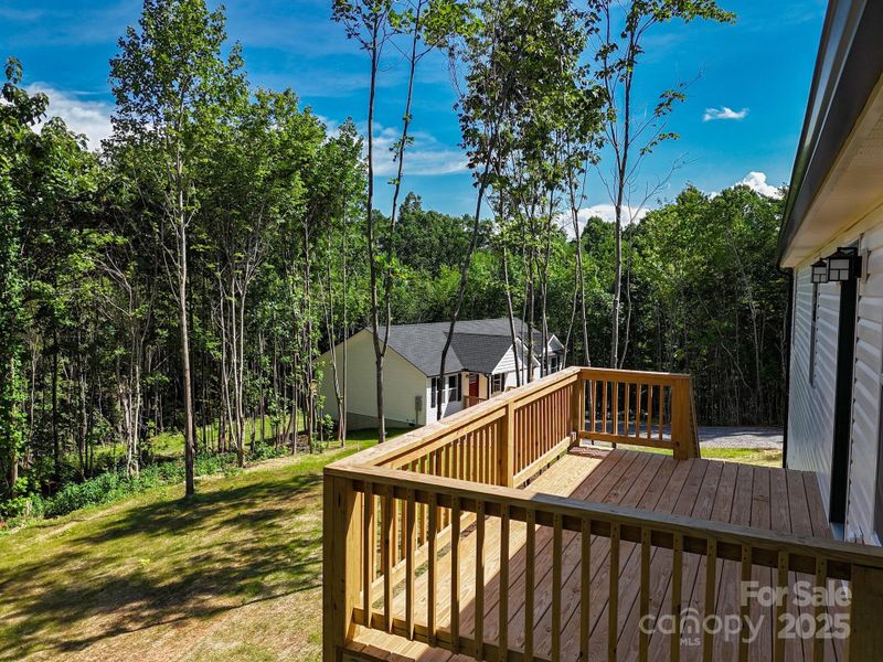 Front exterior of a new home in , Candler, NC, highlighting curb appeal (Image 18).