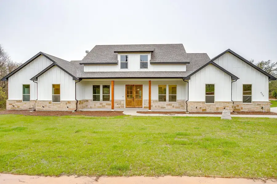 Representative exterior photo of a completed home built from the Pecan Grove by Trinity Classic Homes in The Reserve at Shadle, Poolville, TX (Image 25). Representative exterior photo of a completed home built from the Pecan Grove by Trinity Classic Homes in The Reserve at Shadle, Poolville, TX (Image 25).