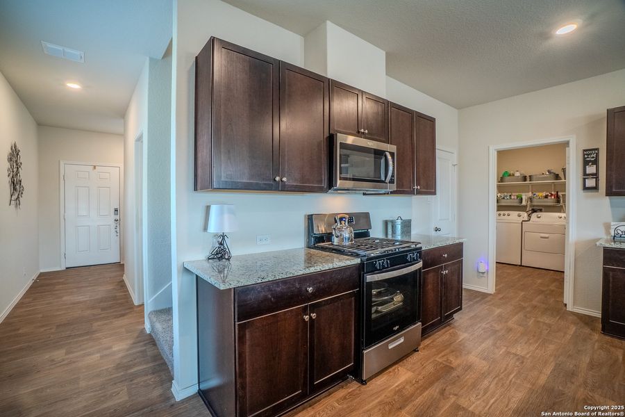 Furnished interior view inside a new home in The Links at River Bend, Floresville (Image 30).