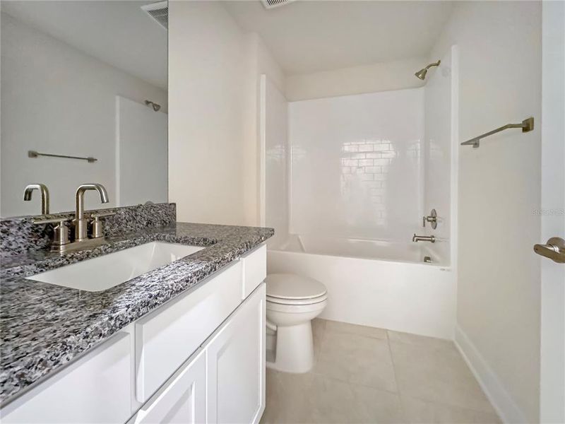 Furnished interior view inside a new home in Harmony Central, Harmony (Image 3).