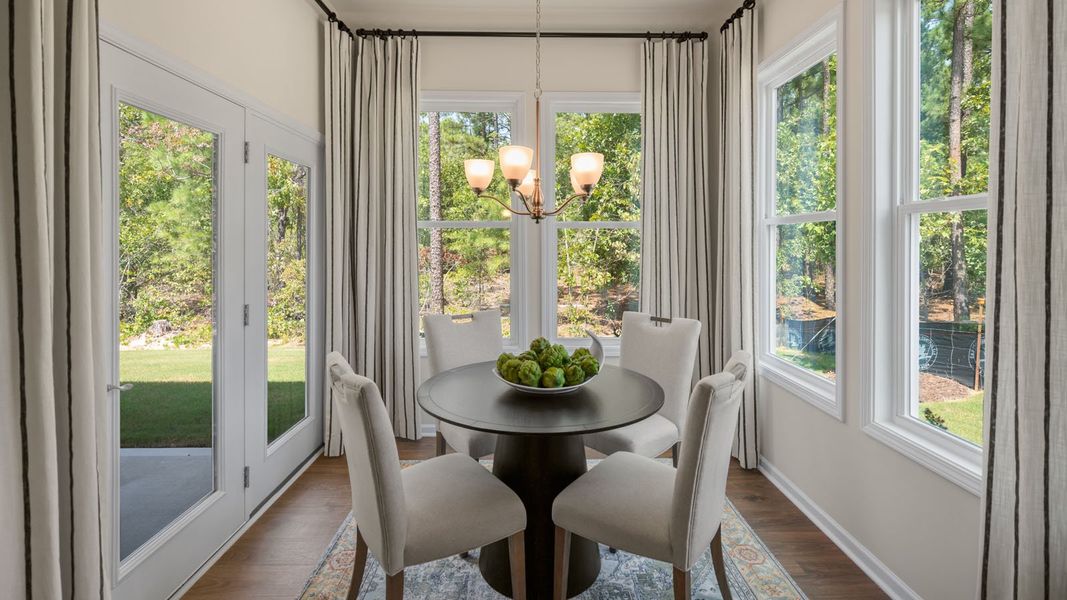 Furnished interior view inside a new home in The Villas at Kinsley, Jamestown (Image 12).