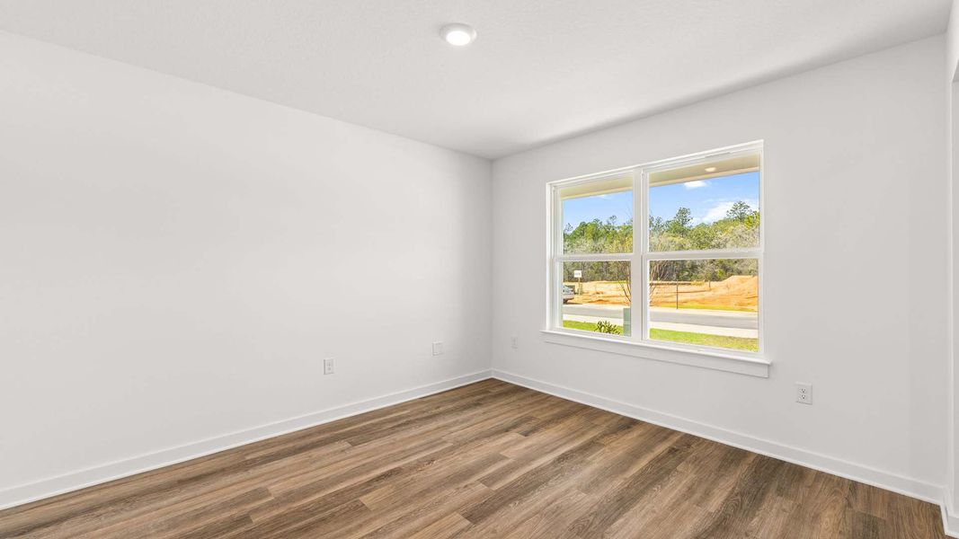 Spacious, unfurnished interior of a new home in Magnolia at the Bluffs Phase 3, Freeport (Image 8).