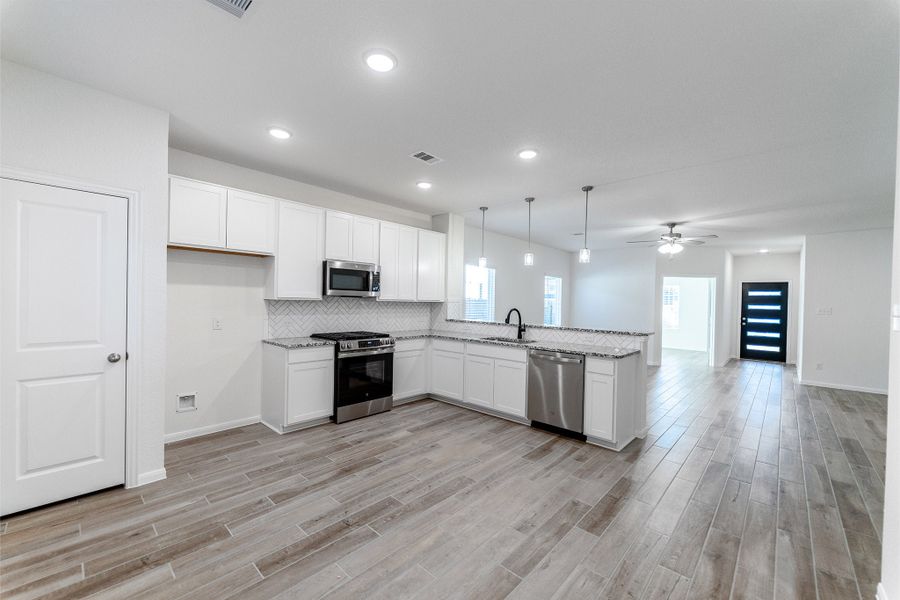 Furnished interior view inside a new home in Cielo, Conroe (Image 5).