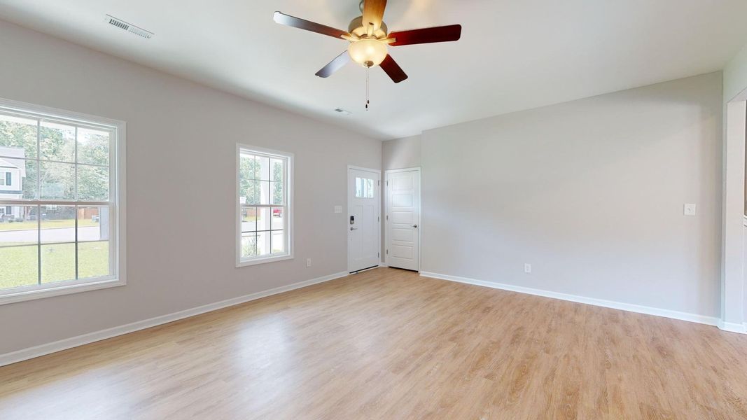 Representative unfurnished interior of a home built from the Tyler A by JC Jackson Homes,LLC in Heritage Pointe, Newport (Image 16).