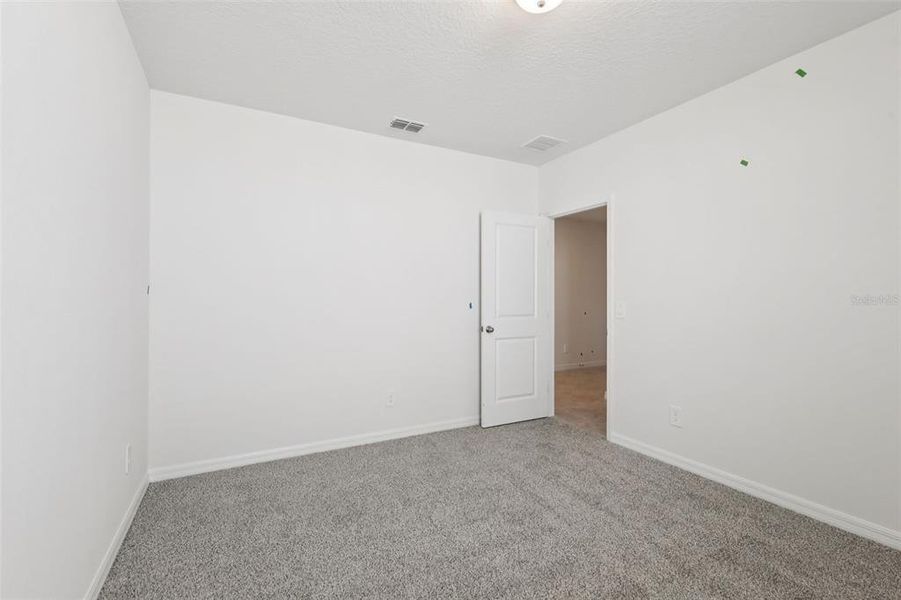 Spacious, unfurnished interior of a new home in Crosswinds - Signature Series, Haines City (Image 35).