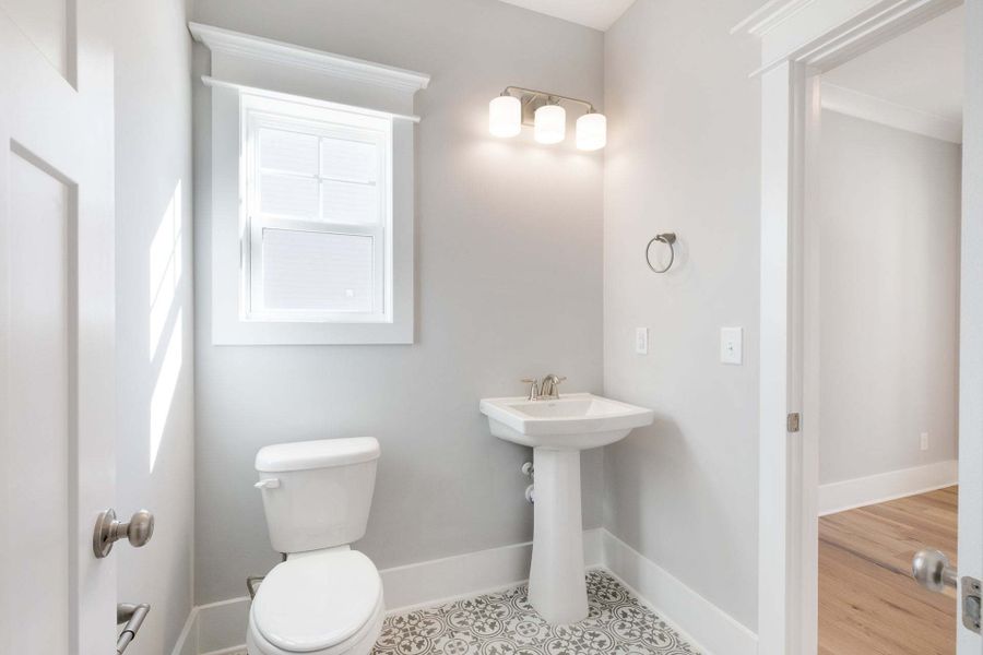 Representative furnished interior of a home built from the Austin by Caviness & Cates Communities in Bartlett Manor, Youngsville (Image 96).