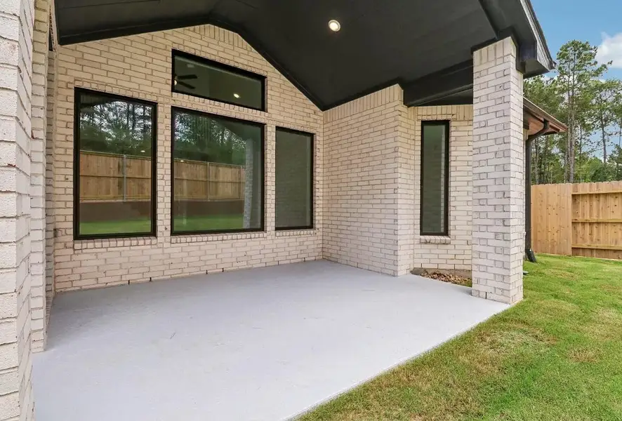Exterior details and patio area of a home in WILDTREE 50', Montgomery (Image 2). Exterior details and patio area of a home in WILDTREE 50', Montgomery (Image 2).