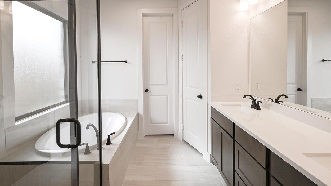 Furnished interior view inside a new home in Crosswinds 50', Kyle (Image 7).