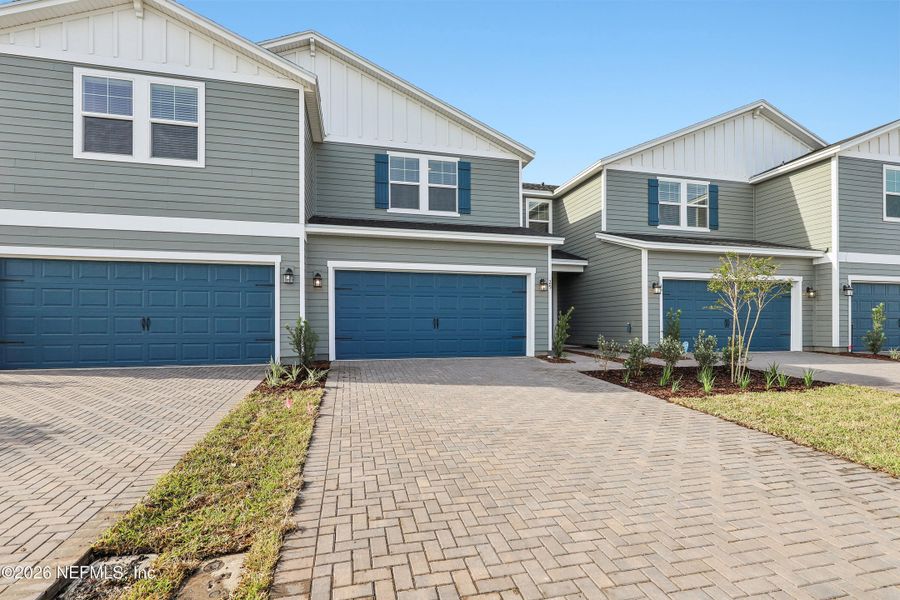 Front exterior of a new home in , St. Augustine, FL, highlighting curb appeal (Image 21).
