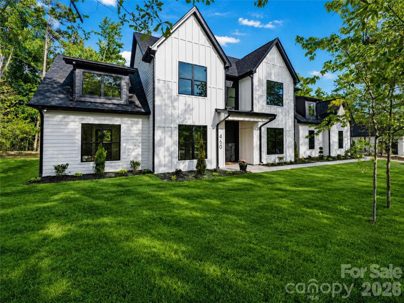 Front exterior of a new home in , Clover, SC, highlighting curb appeal (Image 25).
