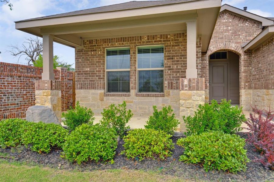 Front exterior of a new home in Cambridge Brook, Denton, TX, highlighting curb appeal (Image 20). Front exterior of a new home in Cambridge Brook, Denton, TX, highlighting curb appeal (Image 20).