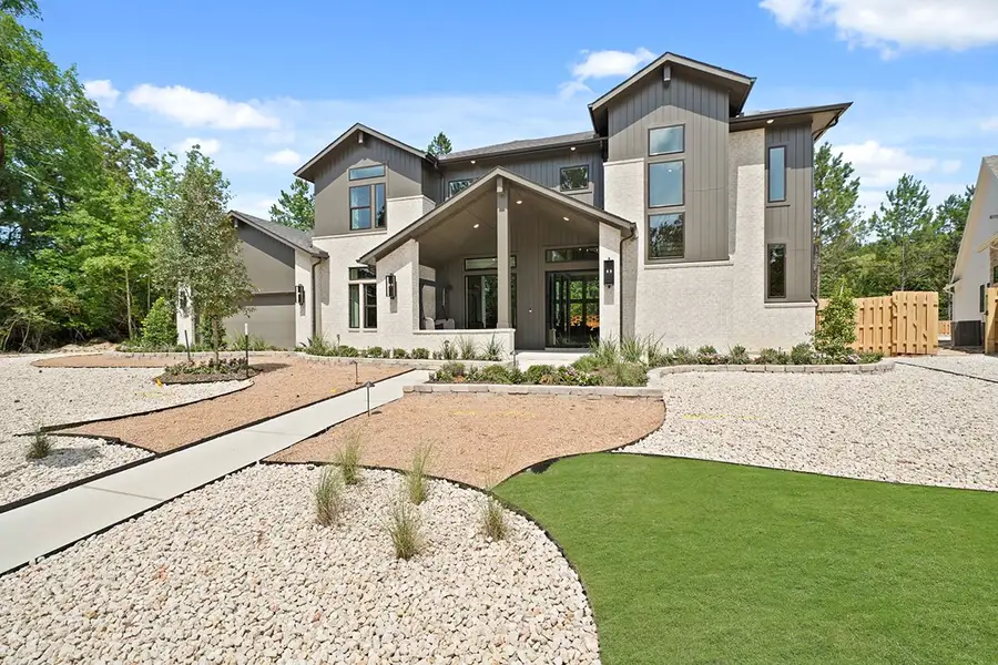 Front exterior of a new home in COLTON - Fedrick Harris, Montgomery, TX, highlighting curb appeal (Image 2). Front exterior of a new home in COLTON - Fedrick Harris, Montgomery, TX, highlighting curb appeal (Image 2).