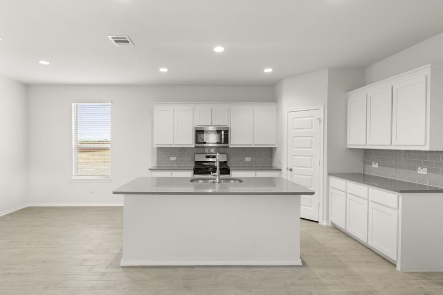 Representative exterior photo of a completed home built from the Maple by Impression Homes in Northspur, Terrell, TX (Image 5).