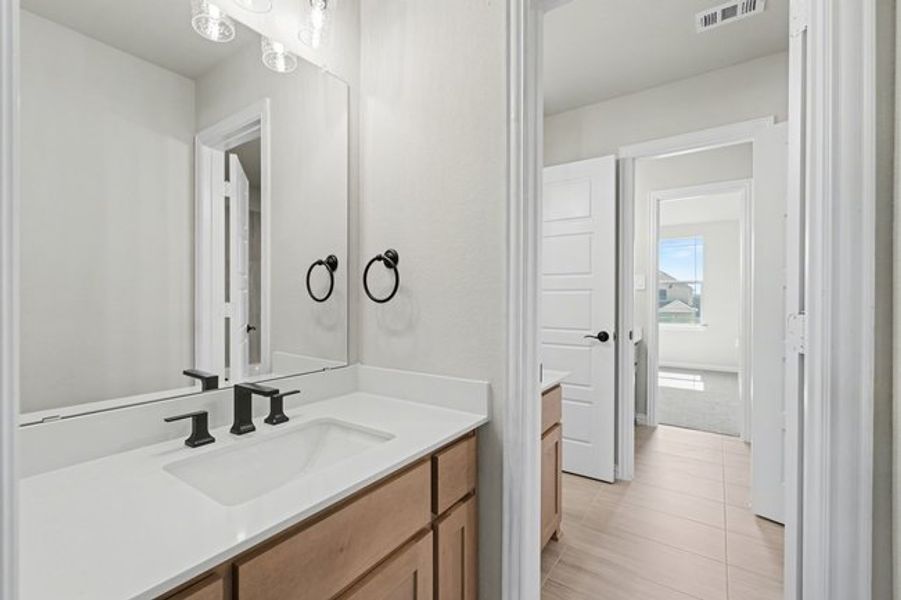 Furnished interior view inside a new home in Sagebrush Addition, Midlothian (Image 13). Furnished interior view inside a new home in Sagebrush Addition, Midlothian (Image 13).