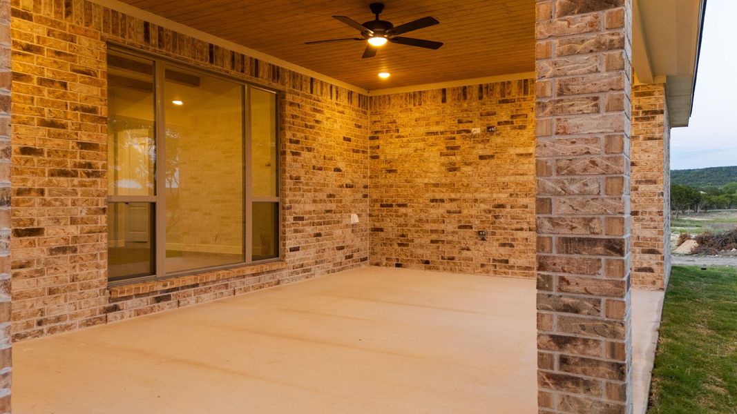 View of patio / terrace with a ceiling fan View of patio / terrace with a ceiling fan