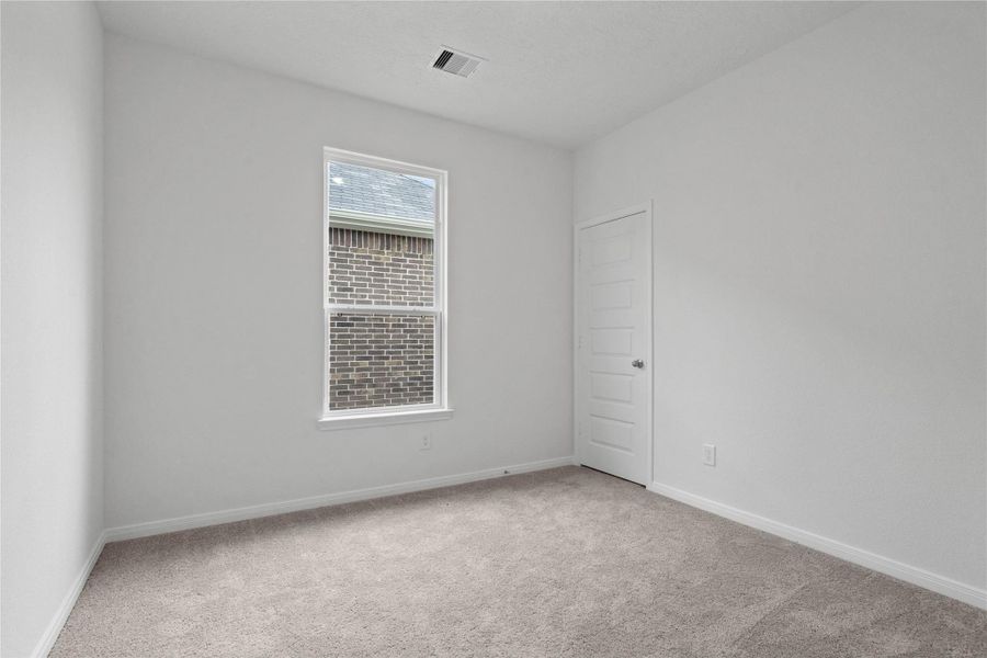 Enjoy an additional private space in this comfortable secondary bedroom. The room is filled with natural light, offers plenty of storage in the walk-in closet, and is perfectly positioned for quiet and relaxation. Enjoy an additional private space in this comfortable secondary bedroom. The room is filled with natural light, offers plenty of storage in the walk-in closet, and is perfectly positioned for quiet and relaxation.