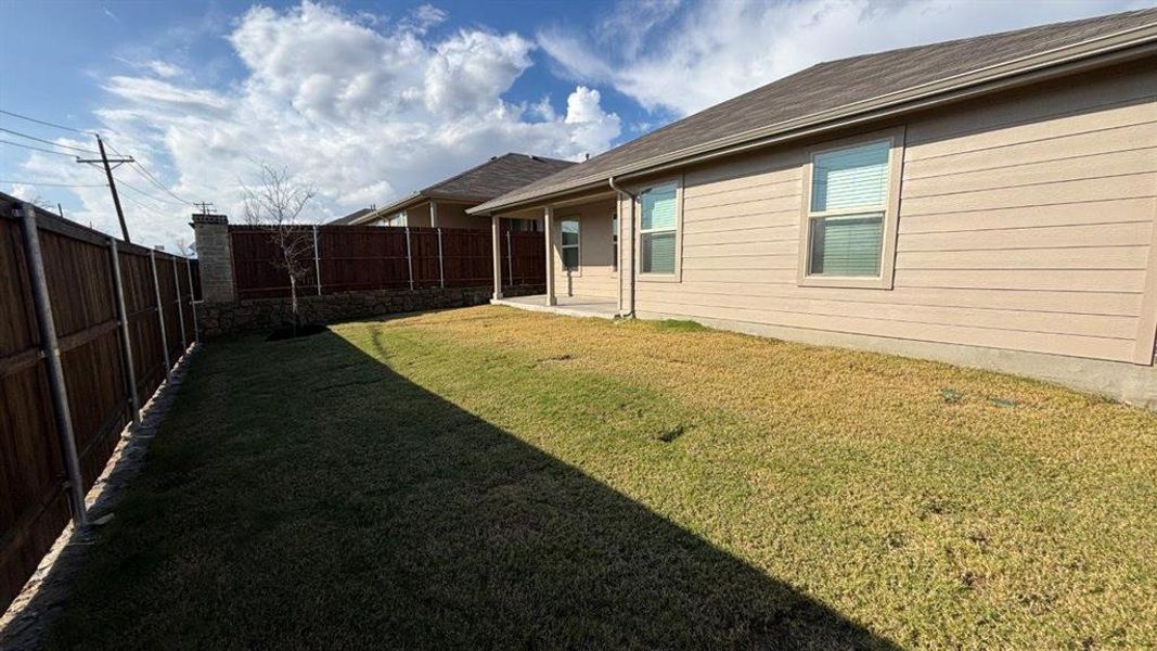 Exterior details and patio area of a home in Highlands at Chapel Creek, Fort Worth (Image 3). Exterior details and patio area of a home in Highlands at Chapel Creek, Fort Worth (Image 3).