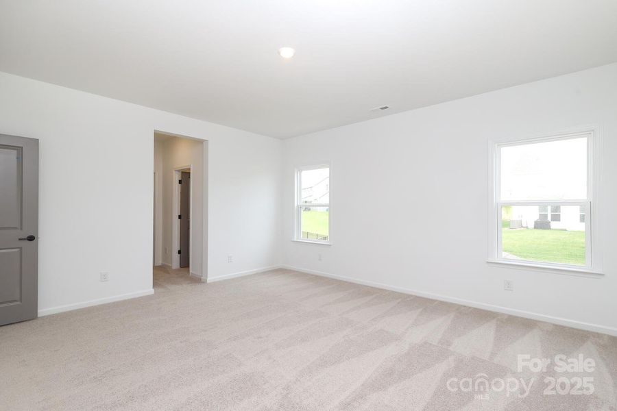 Spacious, unfurnished interior of a new home in Estates at Sugar Creek, Indian Land (Image 33).