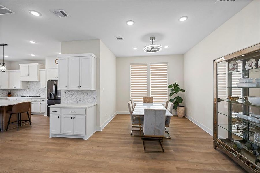 There's a bonus set of cabinets with a countertop between the kitchen and the dining room, great for a coffee bar!