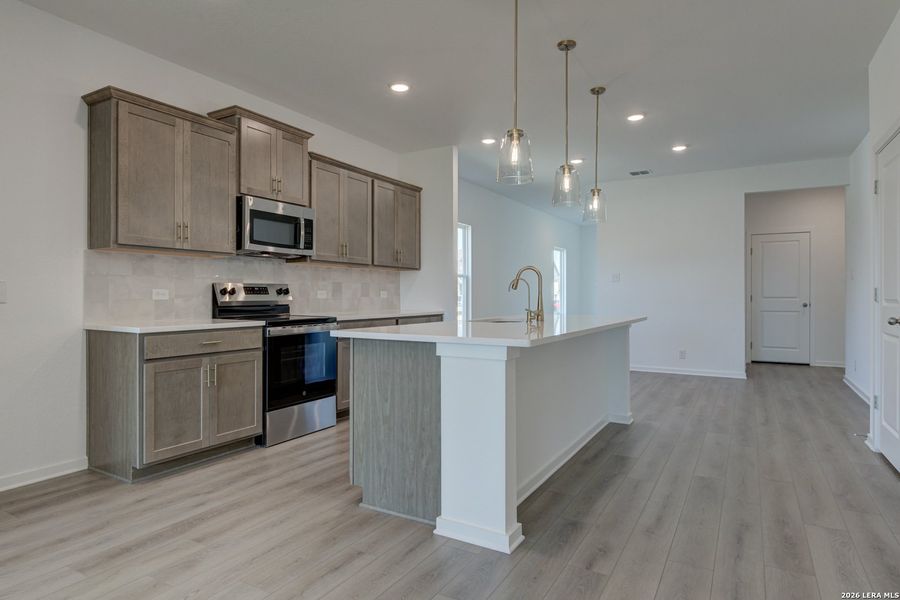 Furnished interior view inside a new home in Hennersby Hollow, San Antonio (Image 11).