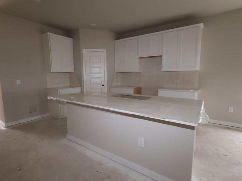 In-progress construction of a new home in Cascades at Onion Creek, Austin, TX (Image 6).