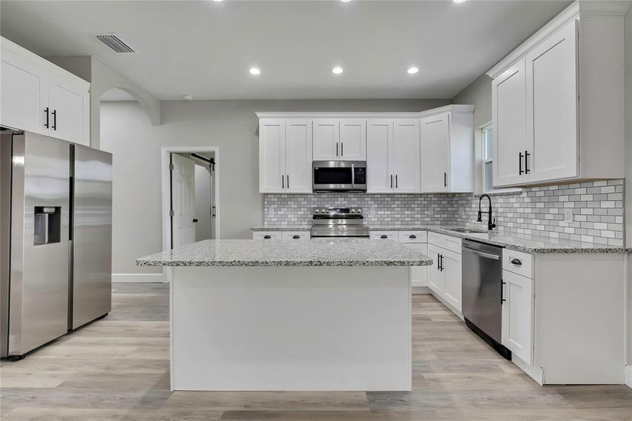 Furnished interior view inside a new home in , Dade City (Image 13).