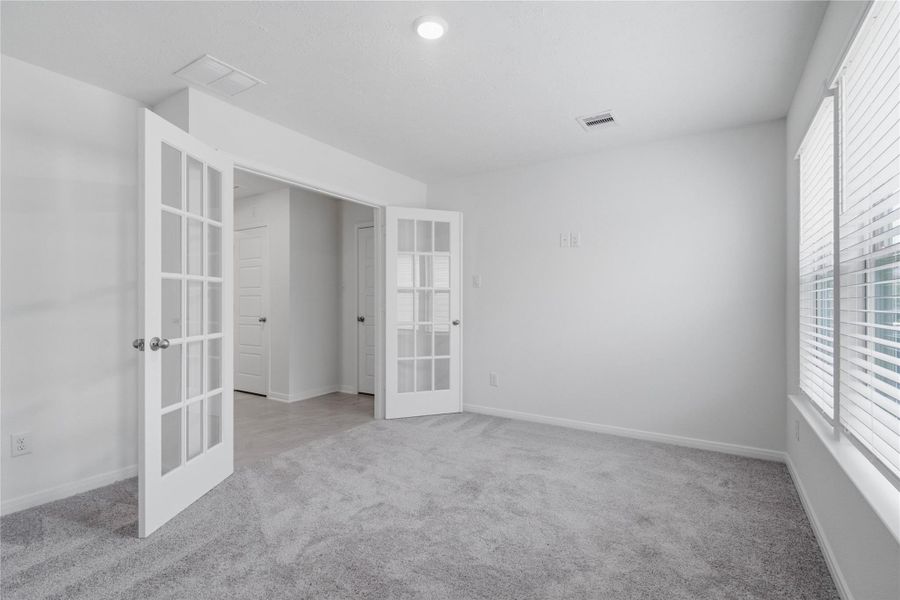 Additional view from the Den with double French doors for added privacy.