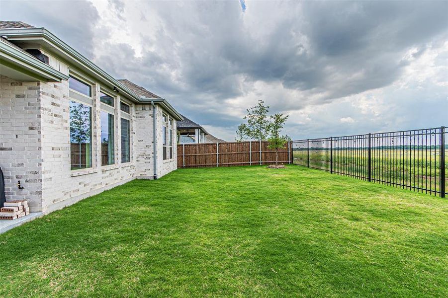 Exterior details and patio area of a home in , Aubrey (Image 26).