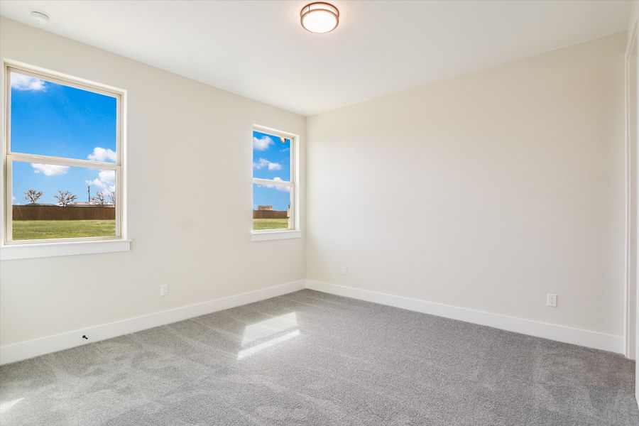 Representative unfurnished interior of a home built from the Avalon by Giddens Homes in Scofield Farms Estates, Georgetown (Image 220).