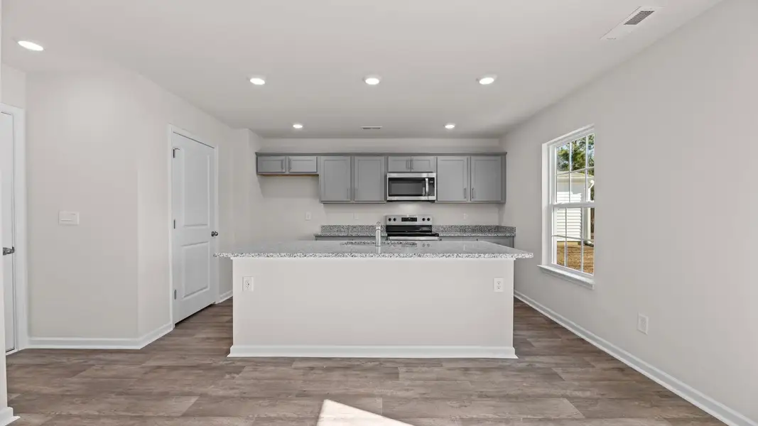Furnished interior view inside a new home in Madeline Farm, New Bern (Image 5).