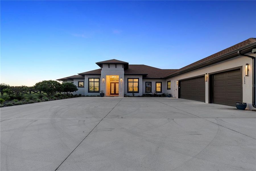 Front exterior of a new home in , Oviedo, FL, highlighting curb appeal (Image 25). Front exterior of a new home in , Oviedo, FL, highlighting curb appeal (Image 25).