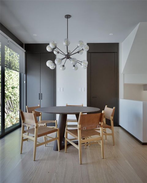 Dining room with a chandelier Dining room with a chandelier