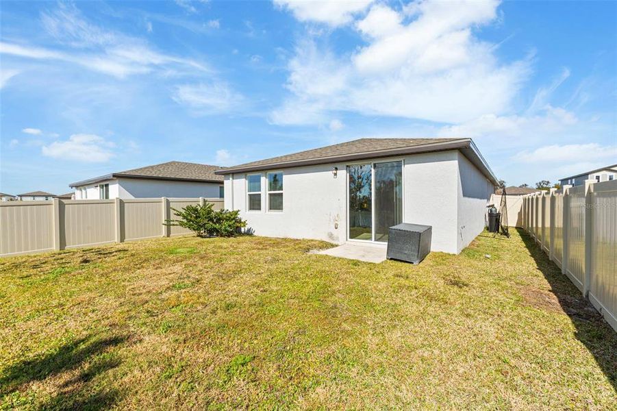 Exterior details and patio area of a home in Park East, Plant City (Image 3).