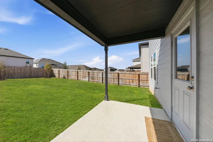 Exterior details and patio area of a home in Cinco Lakes, San Antonio (Image 26).