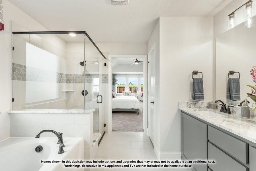 Ensuite bathroom with glass walk-in shower, soaking tub, and gray vanity with marble countertop Ensuite bathroom with glass walk-in shower, soaking tub, and gray vanity with marble countertop