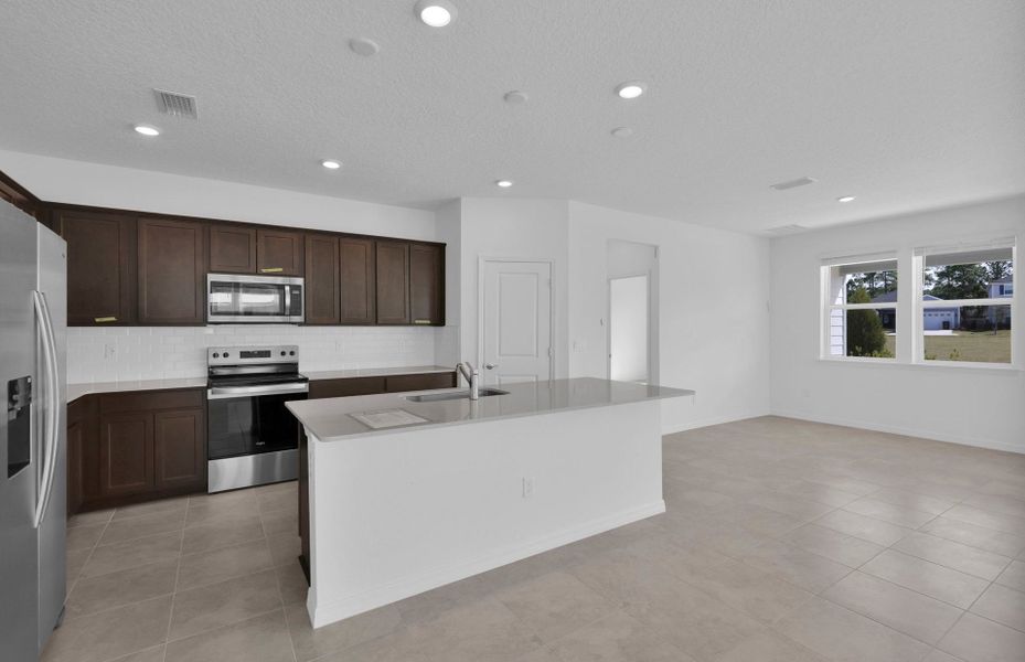 Furnished interior view inside a new home in Hyland Trail, Green Cove Springs (Image 9).