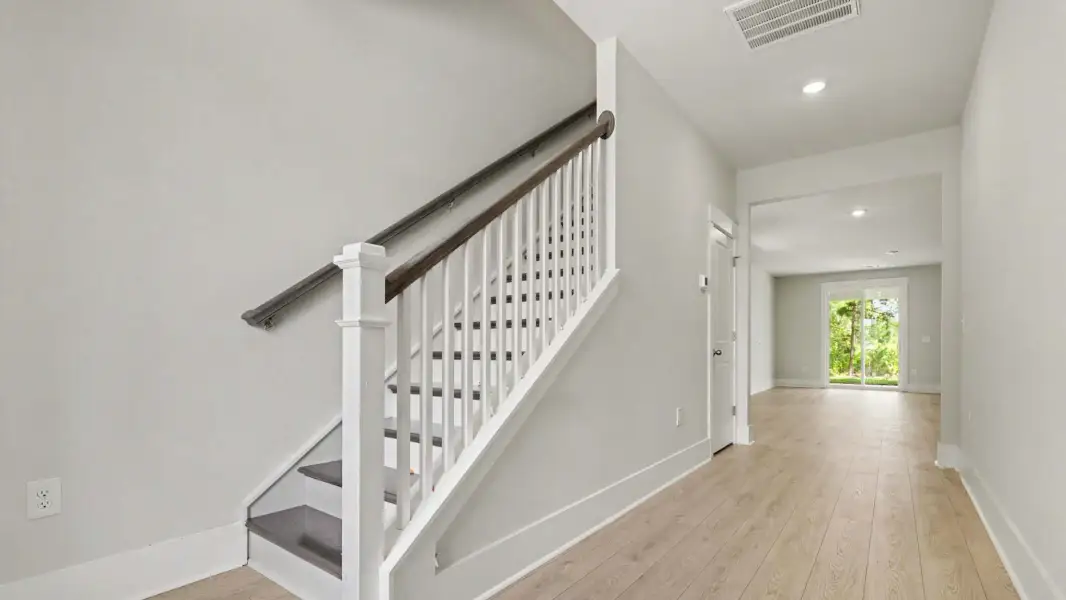 Representative unfurnished interior of a home built from the Woodstock by D.R. Horton in Riverlake, Supply (Image 7).
