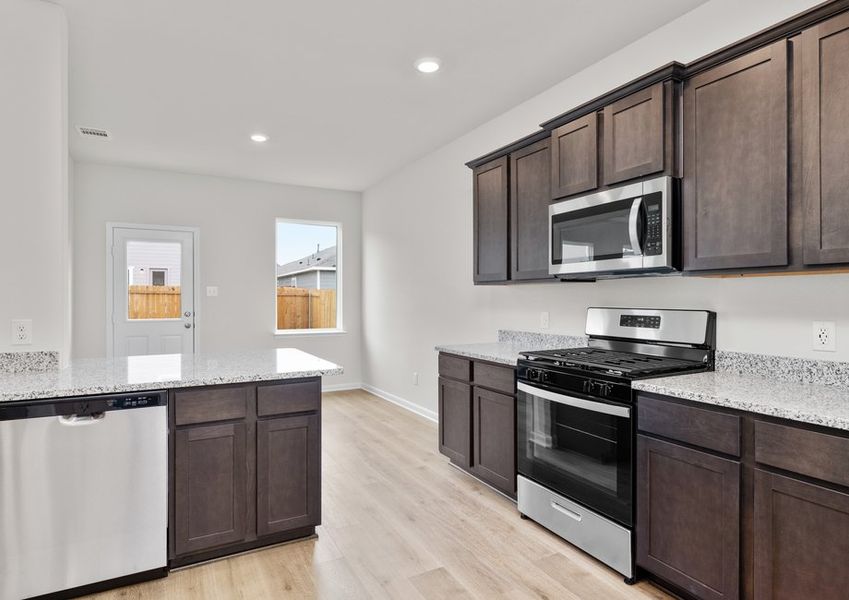 The kitchen has energy-efficient, stainless-steel appliances. The kitchen has energy-efficient, stainless-steel appliances.