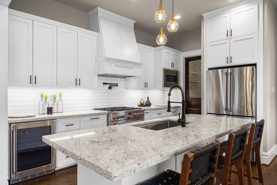 The chef in the family will enjoy the abundant amount of countertop space, stainless steel appliances with commercial grade stove, beverage fridge...and more. The chef in the family will enjoy the abundant amount of countertop space, stainless steel appliances with commercial grade stove, beverage fridge...and more.